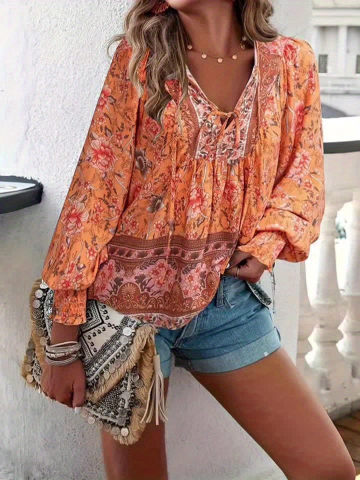 CLARA – Blusa con lazo floral y mangas abullonadas para mujer