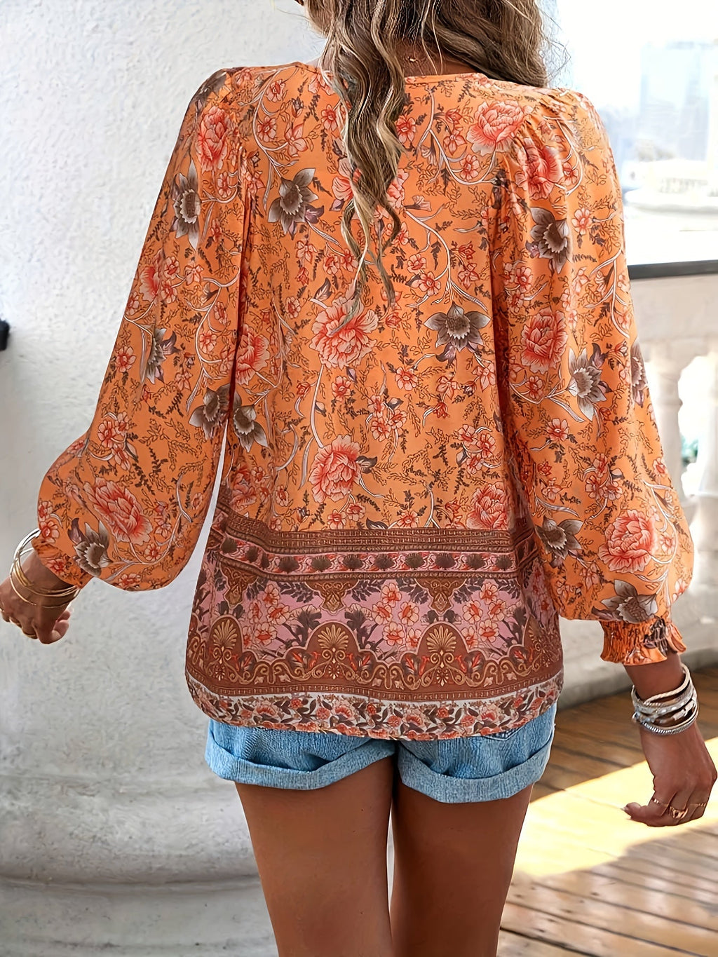 CLARA – Blusa con lazo floral y mangas abullonadas para mujer